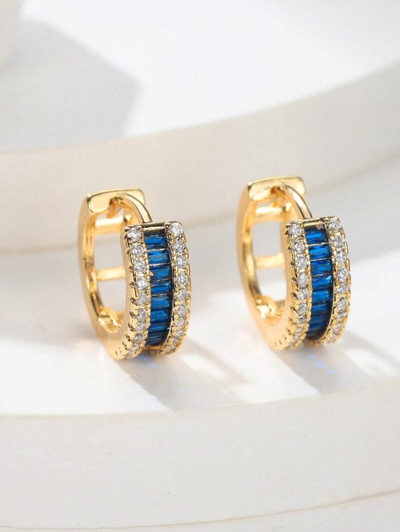 Piekne kolczyki zdobione cyrkoniami oraz niebieskimi kamieniami stal nierdzewna w zlotym kolorze 1