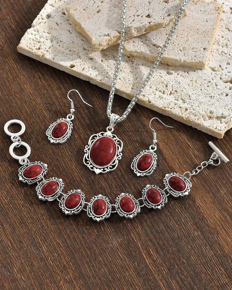 Zestaw bizuteri skladajacej sie z 4 elementow kolczyki naszyjnik oraz regulowana bransoletka stal niedzewna z dodatkiem imitacji kamienia w kolorze burgund 3