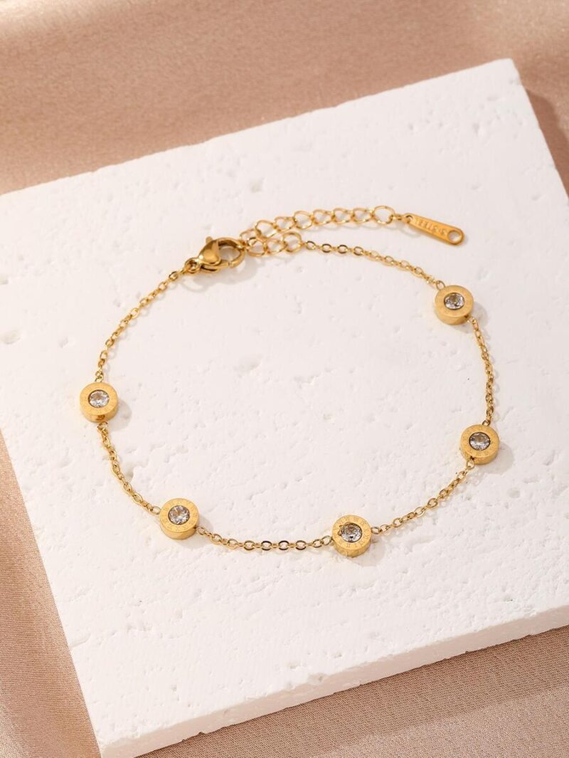 bransoletka stal nierdzewna kolor zloty regulowane zapiecie z bardzo ciekawym wzorem zdobiona cyrkoniami 1