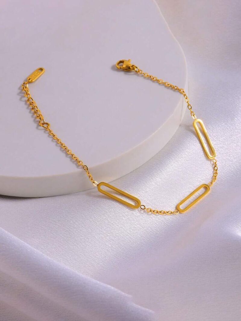 bransoletka-stal-nierdzewna-kolor-zloty-zapiecie-na-regulacji-wzor-widniejacy-na-bransoletce-to-elementy-owalne-5.jpg bransoletka stal nierdzewna kolor zloty zapiecie na regulacji wzor widniejacy na bransoletce to elementy owalne 5