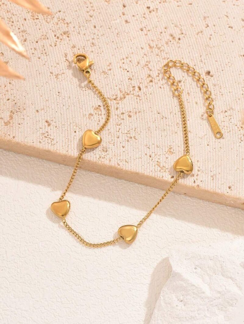 bransoletka z mniejszymi serduszkami calosc to stal nierdzewna w zlotym kolorze 6