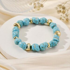 cudna bransoletka bardzo efektowna i oryginalna imitacja turkusu wiec i kolorek turkusowy z dodatkiem zlotych elementw calosc bransoletki trzyma sie na solnidnych gumeczkach 1