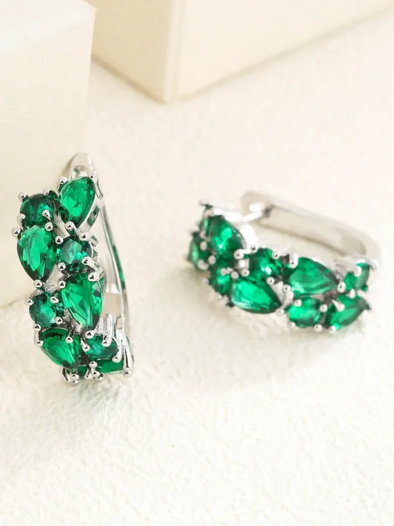 Kolczyki koła ze stali srebrne z zielonymi cyrkoniami (4) Kolczyki kola ze stali srebrne z zielonymi cyrkoniami 4